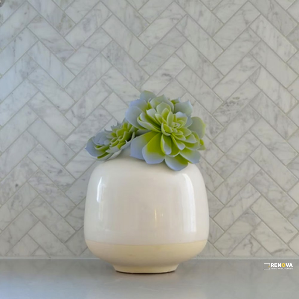 BIANCO CARRARA STONE ESSENTIALS HONED HERRINGBONE MOSAIC 1" X 3"